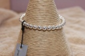 stretchy silver coloured bracelet